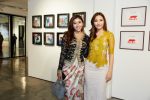 Lesley Cheam, Miss Universe Malaysia ’22 with Karwai Chan, Artist at HARTA Interwoven Realities Exhibition